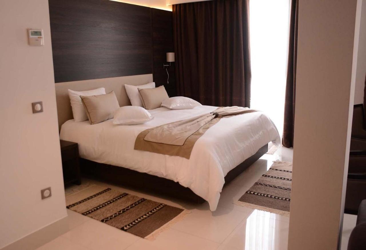 斯法克斯瑞享酒店 外观 照片 A bedroom