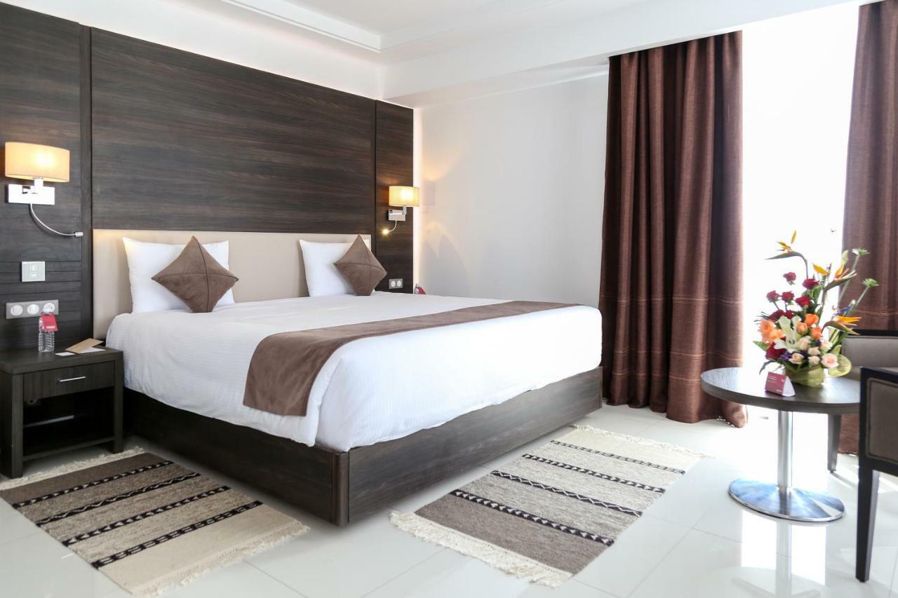 斯法克斯瑞享酒店 外观 照片 A bedroom in a hotel