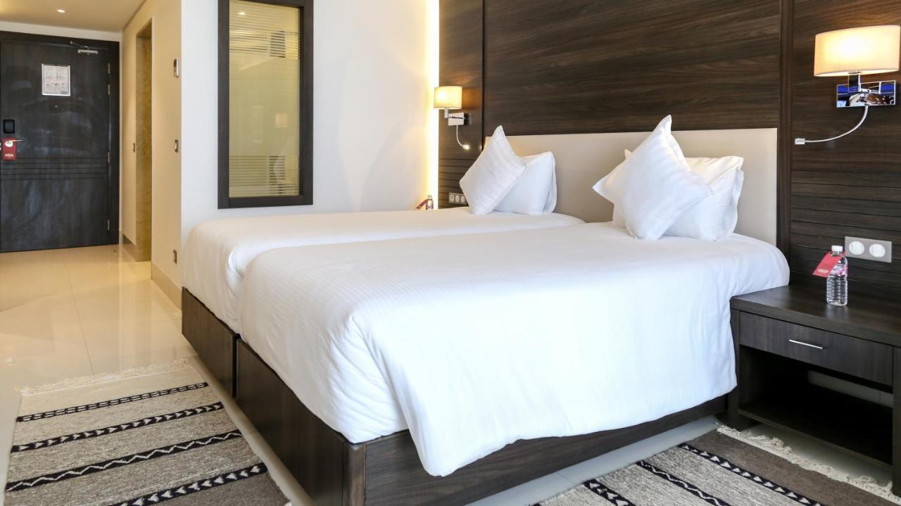 斯法克斯瑞享酒店 外观 照片 A bedroom at the hotel